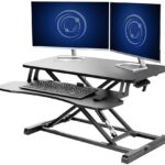Boost_your_productivity_with_an_adjustable_height_convertible_sit_to_stand_up_desk_laptop_desktop_riser